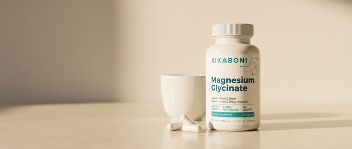 Kikaboni Magnesium Glycinate bottle on a cream countertop in soft evening light