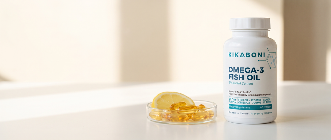 Kikaboni Omega-3 Fish Oil bottle beside a glass dish of softgels and a lemon slice