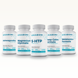 Sleep & Calm Stack: front view of five Kikaboni supplement bottles lined up on white background.